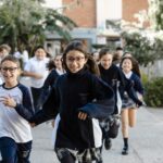 Niños corriendo en el Colegio M.A.S. Calderón